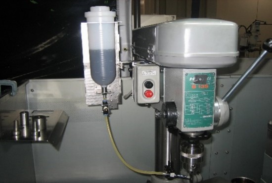 「ボール盤工程における油塗り作業の自動化」改善後の画像